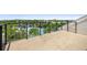 Rooftop patio with community views, dark railings, and an outdoor space at 13618 Heaney Ave, Orlando, FL 32827