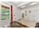 Inviting entryway with tile flooring, bright light, and decorative architectural details at 13768 Bluebird Pond Rd, Windermere, FL 34786