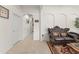 Bright living room showcasing arched doorways, tile floors, and comfortable seating at 13768 Bluebird Pond Rd, Windermere, FL 34786