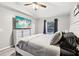 Cozy bedroom with a bed, dresser, and natural light at 14565 Lycastle Cir, Orlando, FL 32826