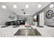 Open floor plan featuring an island kitchen open to the living room, ideal for entertaining at 14565 Lycastle Cir, Orlando, FL 32826