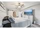 Relaxing bedroom features a sliding barn door and decorative furnishings at 14565 Lycastle Cir, Orlando, FL 32826