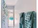 Bathroom with a shower and towels next to the view of the pool area at 14723 Pine Cone Trl, Clermont, FL 34711