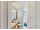 Cozy bathroom featuring tile floors and shower with a blue rug at 14723 Pine Cone Trl, Clermont, FL 34711