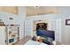 Bright office space with French doors leading to the living room and a built-in bookcase at 14723 Pine Cone Trl, Clermont, FL 34711