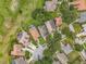 Residential neighborhood with mature trees, manicured lawns, pools and cul-de-sac streets at 16631 Champions Ct, Clermont, FL 34711