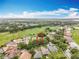 Beautiful aerial view of the community with a home site marked in red at 16631 Champions Ct, Clermont, FL 34711