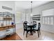 Cozy breakfast nook with table, chairs, and sunny windows at 16631 Champions Ct, Clermont, FL 34711