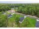 New home with lush green lawn in community backing up to mature forest, a perfect blend of nature and neighborhood at 17485 Sw 41St Cir, Ocala, FL 34473