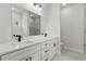 Modern bathroom features double sinks, granite counters, and tiled shower at 17485 Sw 41St Cir, Ocala, FL 34473