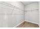 Walk in closet features laminate floors and wire shelving at 17485 Sw 41St Cir, Ocala, FL 34473