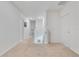 Upstairs hallway with carpet and doors at 1854 Juneberry St, Clermont, FL 34715