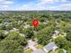Aerial view of a neighborhood location marked by red pin and surrounded by lush greenery at 2244 Brookshire Ave, Winter Park, FL 32792