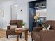 Cozy living area features neutral tones, stylish decor, and a charming nook with a built-in bar at 2244 Brookshire Ave, Winter Park, FL 32792