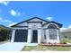 Charming single-story home features a well-maintained exterior and manicured lawn at 2524 Daffadil Ter, Sanford, FL 32771