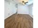 Spacious living room features vaulted ceilings, new flooring, and abundant natural light at 2524 Daffadil Ter, Sanford, FL 32771