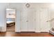 Hallway leading to the bedroom, storage and the staircase at 2901 Edenshire Way # 102, Kissimmee, FL 34746