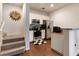 Efficient kitchen featuring stainless appliances and convenient breakfast bar seating at 2901 Edenshire Way # 102, Kissimmee, FL 34746