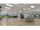 Spacious activity room with ping pong table, mirrored walls and exercise equipment at 307 Monterey St, Kissimmee, FL 34759