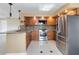 Updated kitchen with granite countertops, stainless steel appliances, and tiled backsplash at 344 Blue Bayou Dr, Kissimmee, FL 34743