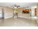 Spacious living area seamlessly connecting to the kitchen and entryway at 344 Blue Bayou Dr, Kissimmee, FL 34743