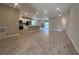 Spacious open-concept living room featuring tile floors and recessed lighting throughout at 3950 Alba Dr, Indian Lake Estates, FL 33855