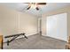 Bright bedroom with ceiling fan, ample closet space, and neutral tones at 4102 Plantation Cove Dr # 201, Orlando, FL 32810