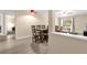 Open floor plan showcasing the dining room and living room, creating an inviting space at 4102 Plantation Cove Dr # 201, Orlando, FL 32810