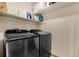 Laundry area with modern front-load washer and dryer at 4102 Plantation Cove Dr # 201, Orlando, FL 32810