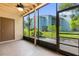 Enclosed lanai with ceiling fan for outdoor comfort and shade at 4102 Plantation Cove Dr # 201, Orlando, FL 32810