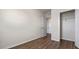A simple bedroom with a closet and doorway view into another room at 4602 Linda Dr, Lake Wales, FL 33859
