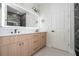Stylish bathroom featuring modern lighting, sleek black accents, and a double sink vanity at 5161 Dove Tree St, Orlando, FL 32811