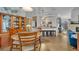 Bright breakfast nook featuring natural light, wood floors, and a view of the kitchen at 5430 Baytowne Pl, Oviedo, FL 32765
