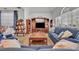 Bright and inviting living room with hardwood floors and cozy seating at 5430 Baytowne Pl, Oviedo, FL 32765