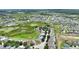 High angle view of a house within a community with a natural conservation area backdrop at 546 Windsor Pl, Davenport, FL 33896