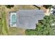 Birds-eye perspective showing house roof and screened-in pool at 546 Windsor Pl, Davenport, FL 33896