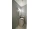 Bathroom features a granite countertop vanity and a framed mirror at 546 Windsor Pl, Davenport, FL 33896