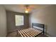 This bedroom features neutral colored walls, carpet floors, and window at 546 Windsor Pl, Davenport, FL 33896