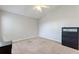 This bedroom has neutral paint and plush carpeting at 546 Windsor Pl, Davenport, FL 33896