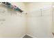 Walk-in closet with a shelf for storage at 546 Windsor Pl, Davenport, FL 33896