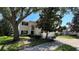 Well-maintained two-story home with a manicured front lawn and inviting curb appeal at 546 Windsor Pl, Davenport, FL 33896