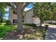 Charming two-story home with an attached two car garage and verdant landscaping at 546 Windsor Pl, Davenport, FL 33896