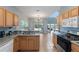 Spacious kitchen with island, updated appliances, and open layout at 546 Windsor Pl, Davenport, FL 33896