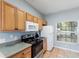 Charming kitchen with modern appliances and plenty of cabinet space at 546 Windsor Pl, Davenport, FL 33896