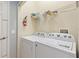 Laundry room featuring a washer and dryer at 546 Windsor Pl, Davenport, FL 33896