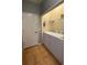 Convenient laundry room featuring a full-size washer and dryer, ample storage, and tile floors at 546 Windsor Pl, Davenport, FL 33896