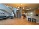 Open-concept living space showcasing a staircase, neutral walls and tile flooring at 546 Windsor Pl, Davenport, FL 33896