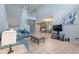 Bright living room featuring high ceilings, tile floors, and an open floor plan at 546 Windsor Pl, Davenport, FL 33896