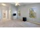 Spacious main bedroom with vaulted ceilings, two windows, and plush carpeting at 546 Windsor Pl, Davenport, FL 33896