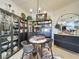 Chic dining area featuring dark wood shelving and decor at 6336 Buford St # 207, Orlando, FL 32835
